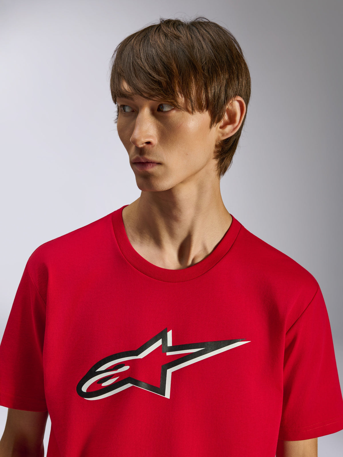 Alpinestars Ageless Shadow CSF Tee, Short Sleeve T-Shirt, Red, Front Ageless star logo with black and white shadow effect, worn by a model, casual motorsport-inspired design