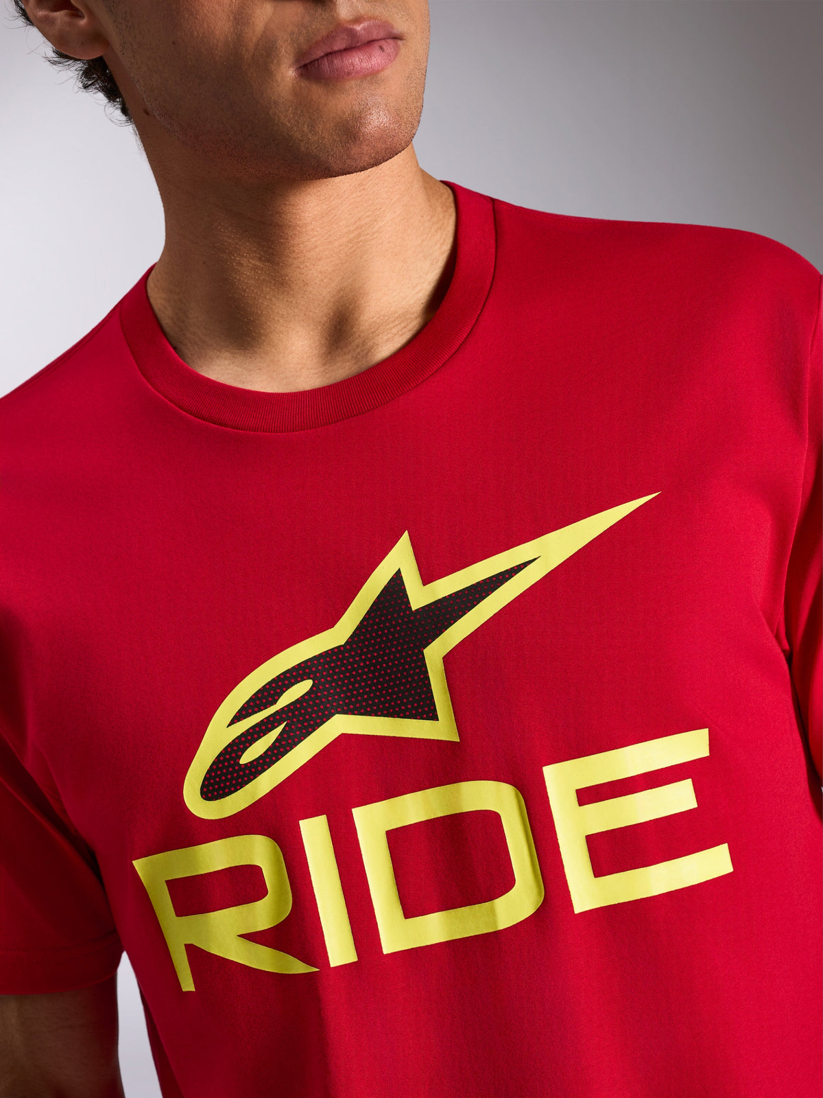 Alpinestars Ride 4.0 CSF Tee, Short Sleeve T-Shirt, Red, Front logo with black and hi-vis yellow Astars symbol and yellow RIDE text, casual motorsport sportswear