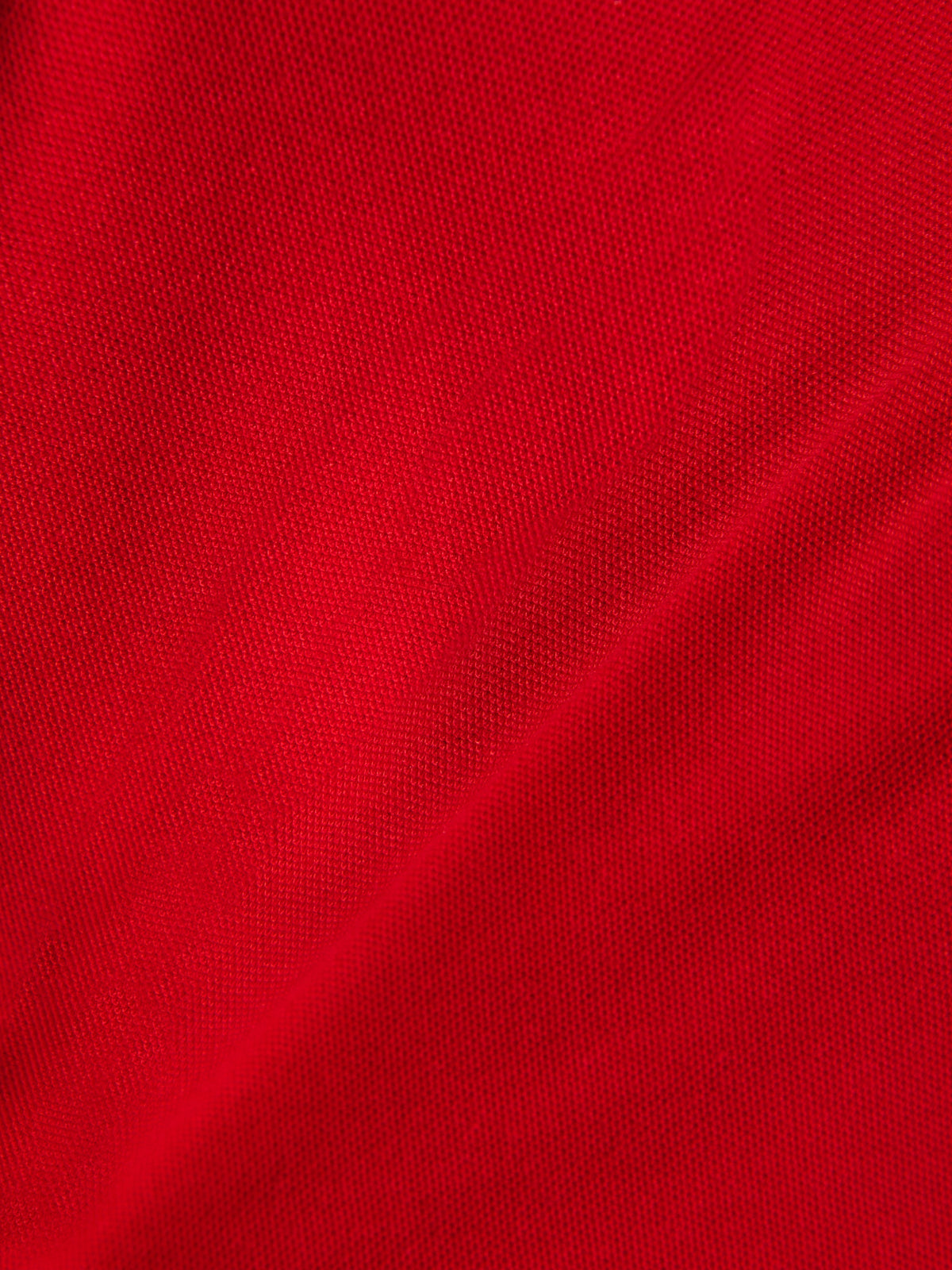 Alpinestars Endeavor Classic Polo, Detail shot of Red pique fabric, textured knit material, cotton-polyester blend, casual motorsport sportswear