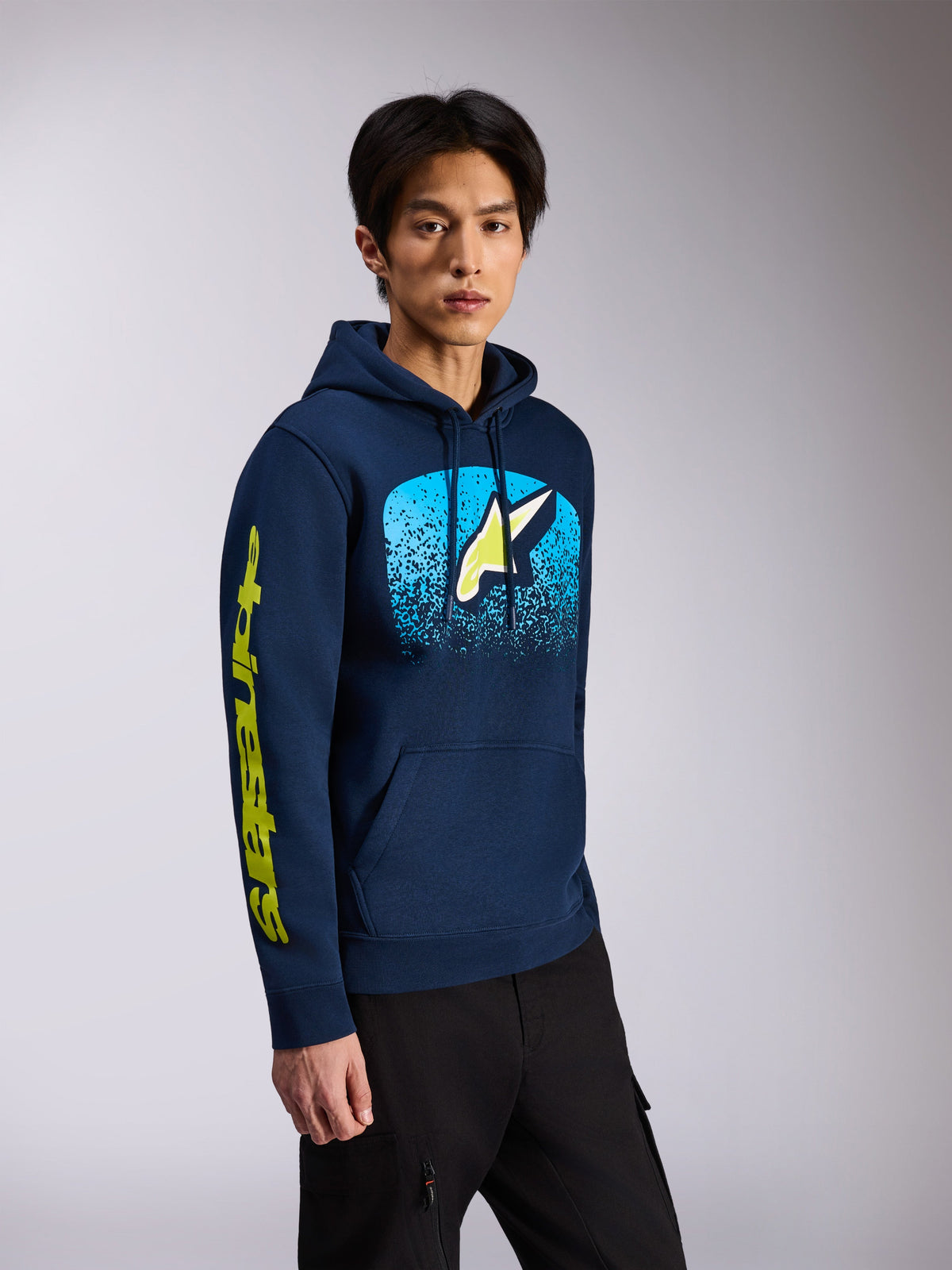 Alpinestars Obsessed Hoodie, Navy Blue, pullover fleece hoodie, featuring front Astars logo with light blue MX gradation and yellow wordmark on the sleeve, drawstring hood, casual motorsport streetwear