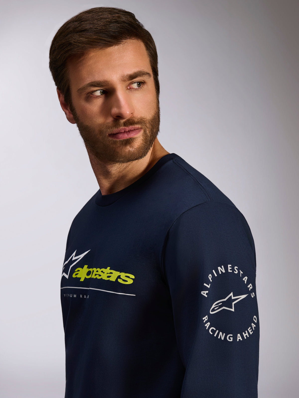 Alpinestars Mandatory CSF Tee, Long Sleeve T-Shirt, Navy Blue, featuring white and lime green front logo and circular Alpinestars Racing Ahead logo on the sleeve, casual motorsport streetwear