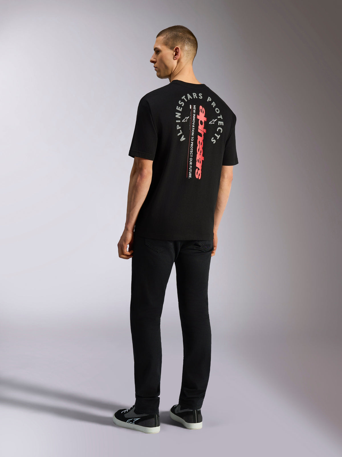 Alpinestars Overhang Oversized CSF Tee, Short Sleeve T-Shirt, Black, featuring vertical red wordmark and circular white graphic on back, casual motorsport streetwear