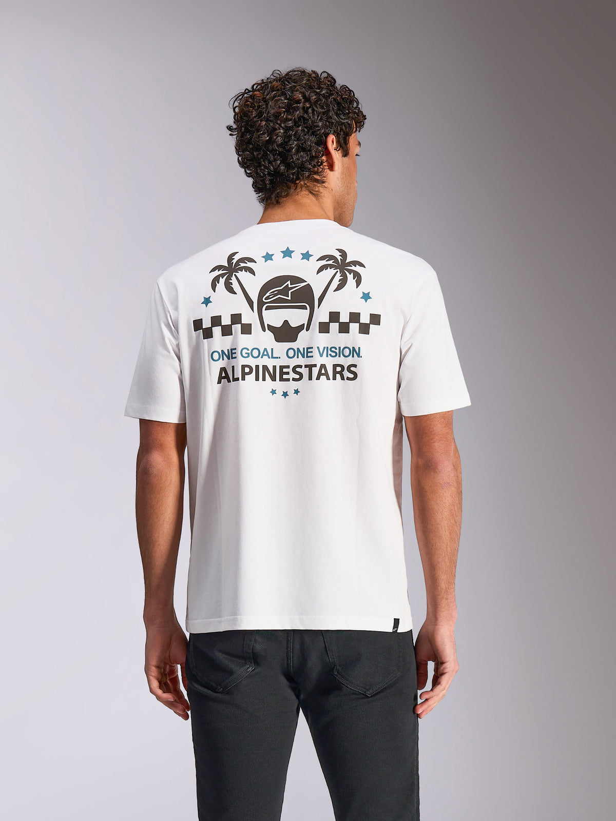 Alpinestars Order CSF Tee, Short Sleeve T-Shirt, White, Back view showing helmet and palm tree graphic with 'ONE GOAL. ONE VISION.' text, casual motorsport streetwear