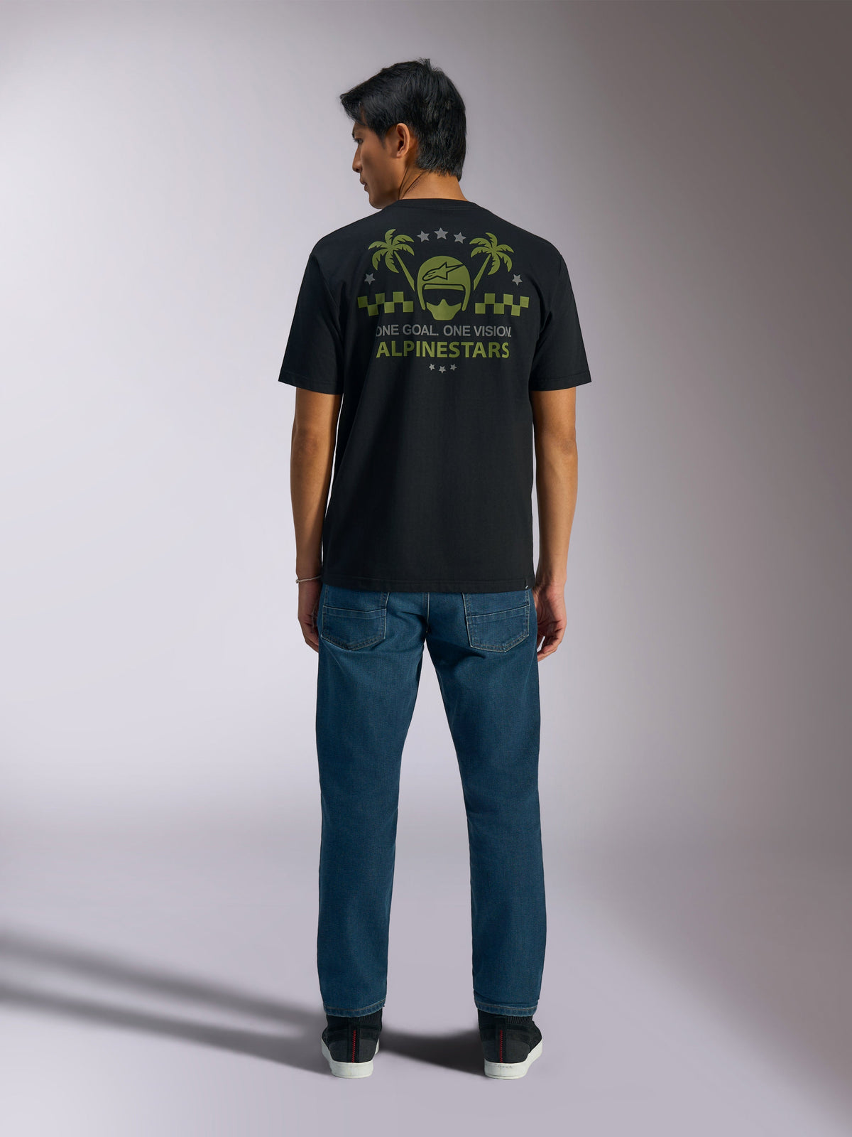 Alpinestars Order CSF Tee, Short Sleeve T-Shirt, Black, Back view featuring olive green helmet and palm tree graphic with 'One Goal One Vision' text, Casual Motorsport Streetwear