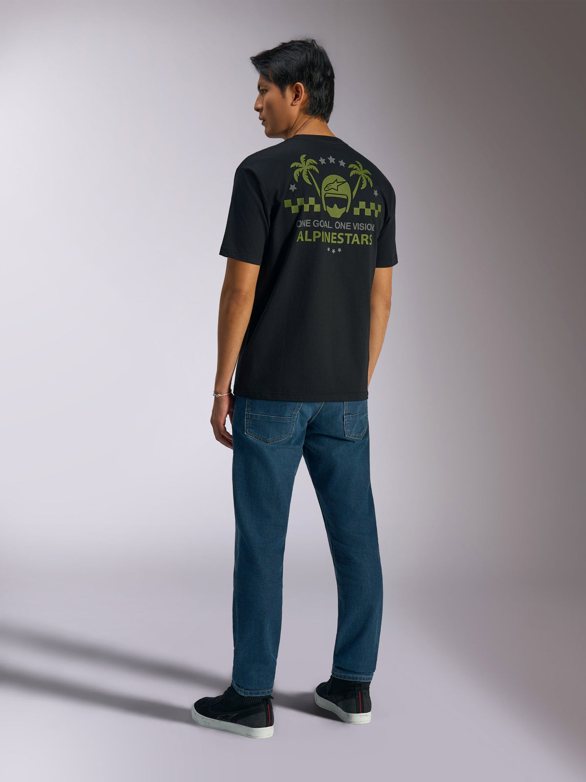 Alpinestars Order CSF Tee, Short Sleeve T-Shirt, Black, Back view with green helmet and palm tree graphic, 'One Goal. One Vision.' text, Casual Motorsport Streetwear