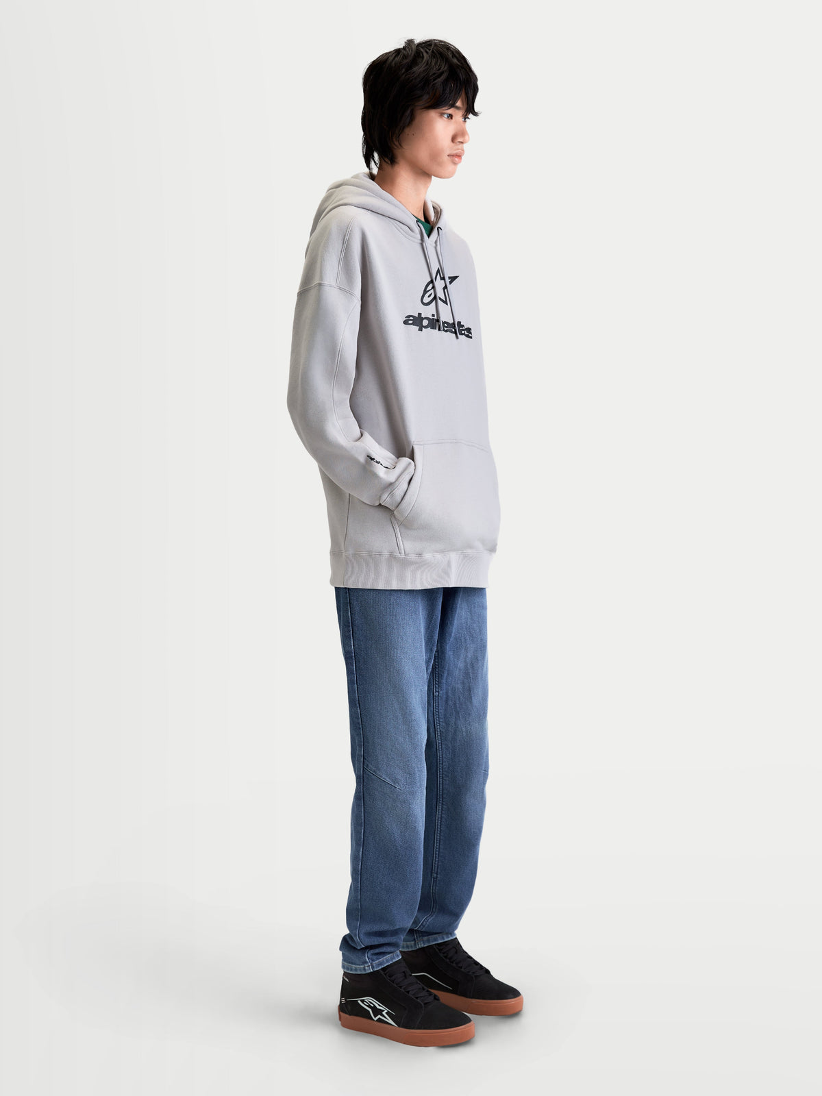 Alpinestars Prelude Oversized Hoodie, casual sportswear fleece pullover for men, Cement Gray with black puff-print front logo, features a relaxed fit, kangaroo pocket, and self-lined hood.