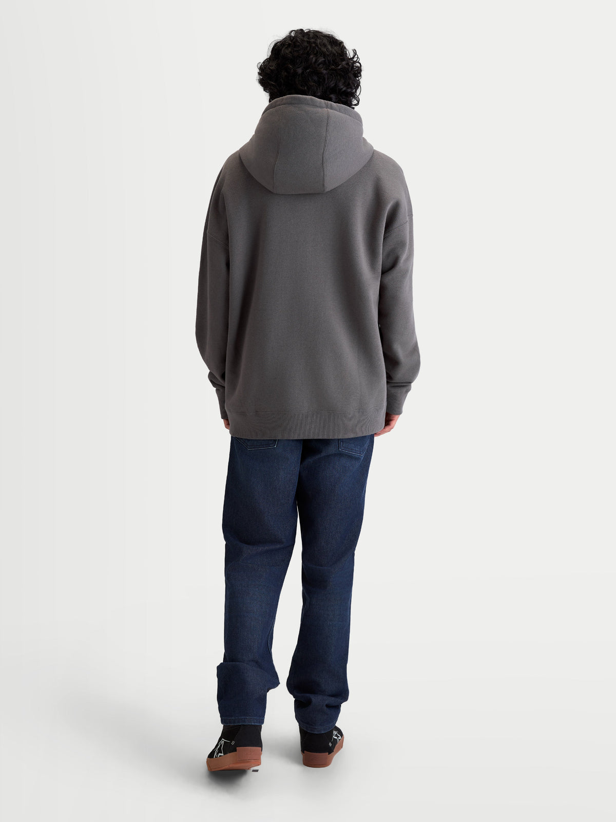 Alpinestars Entity Oversized Hoodie, Sportswear Zip-Up Fleece, Unisex, Charcoal Gray, Back View on Model showing Relaxed Fit, Self-Lined Hood, and Ribbed Cuffs, Cotton and Recycled Polyester Blend