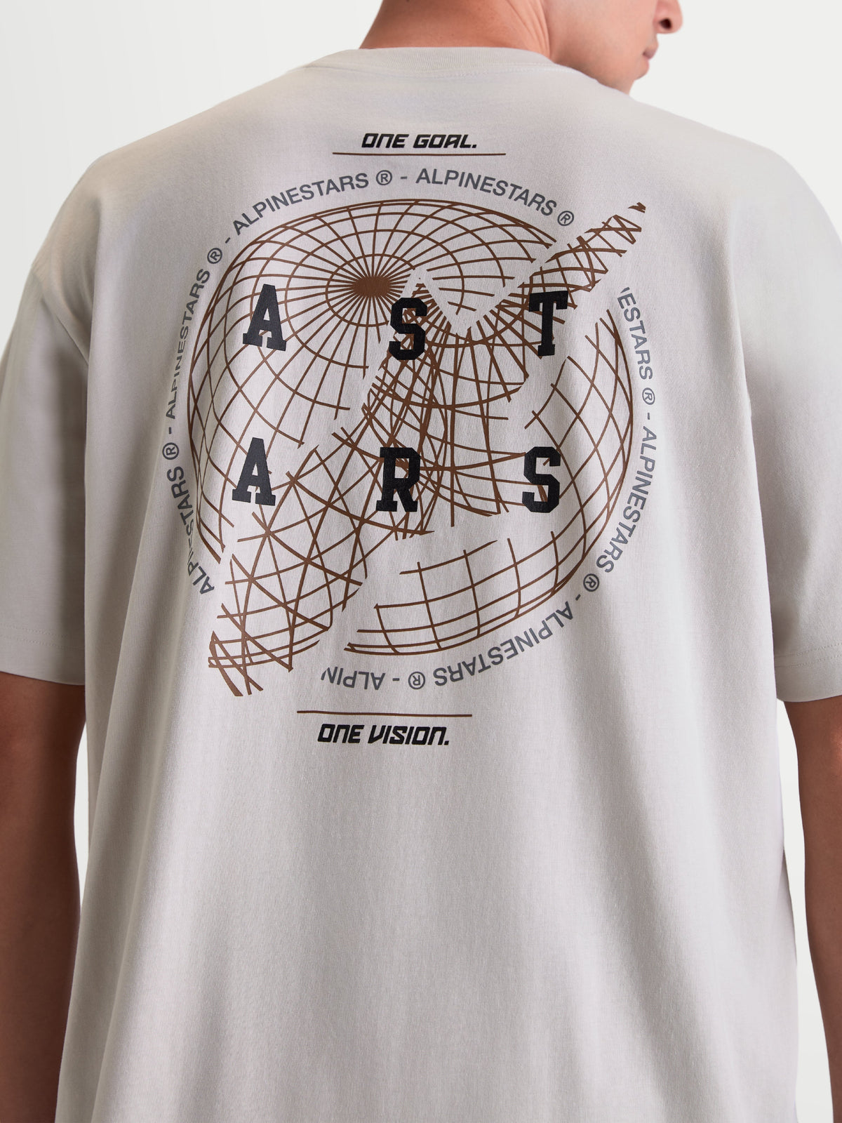 Alpinestars Latitude Oversized CSF Tee, Short Sleeve Sportswear T-Shirt, Cement Gray, back view featuring large globe graphic with ASTARS wordmark and One Goal One Vision mottos, relaxed oversized fit, cotton-poly blend.