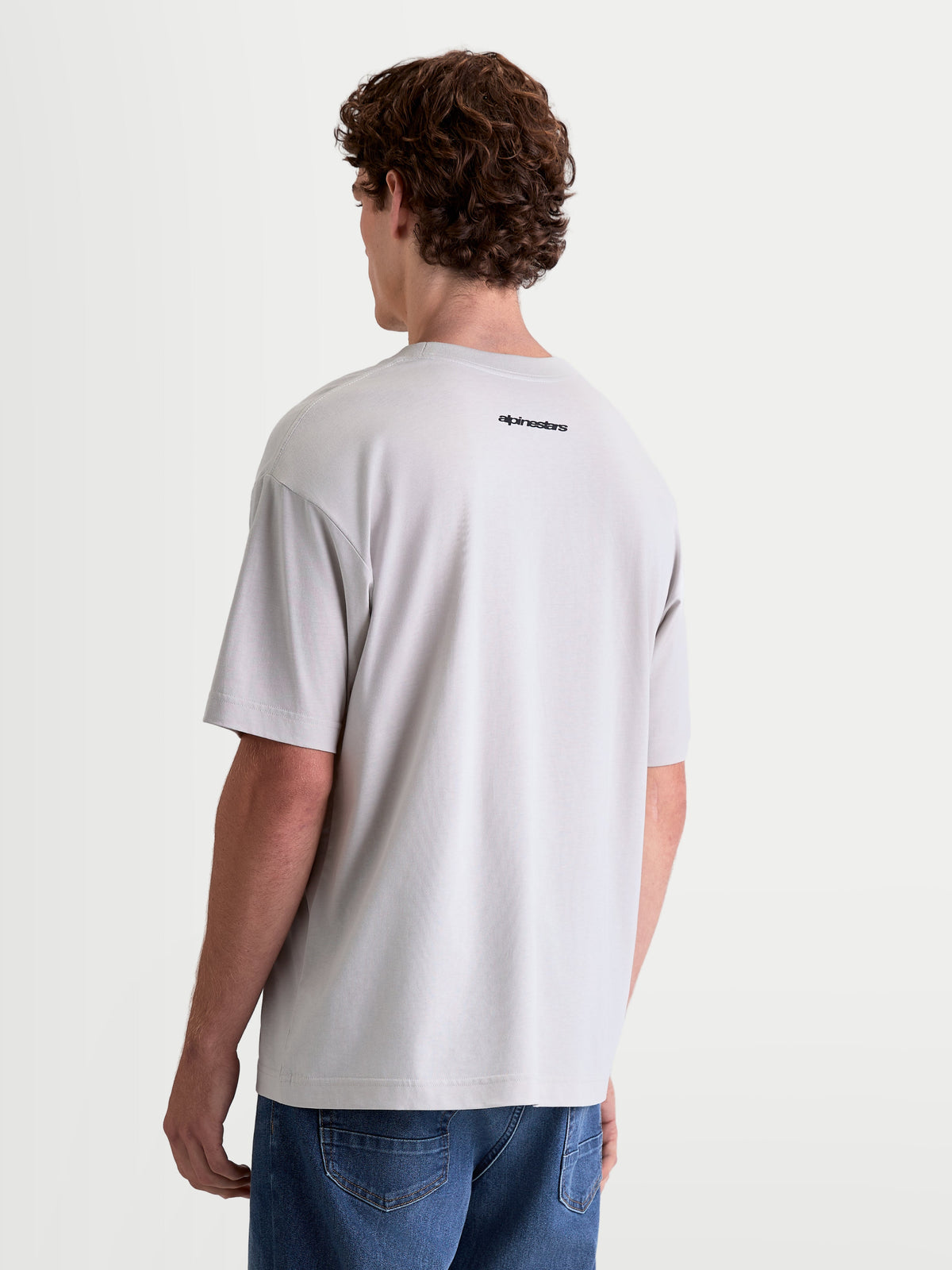 Alpinestars Prelude Oversized CSF Tee, Short Sleeve Sportswear T-Shirt, Gray Cement with Black Rear Alpinestars Logo, Relaxed Fit, Cotton-Poly Blend, On-Model Back View