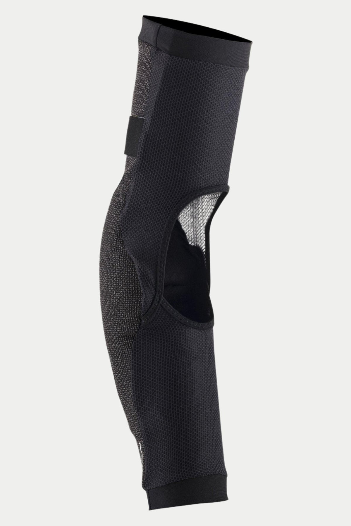 Alpinestars Paragon Pro Elbow Protector, Black, side view showing breathable stretch mesh construction and a large ventilation window at the back, ergonomic slip-on design with elasticated cuffs for mountain biking protection.