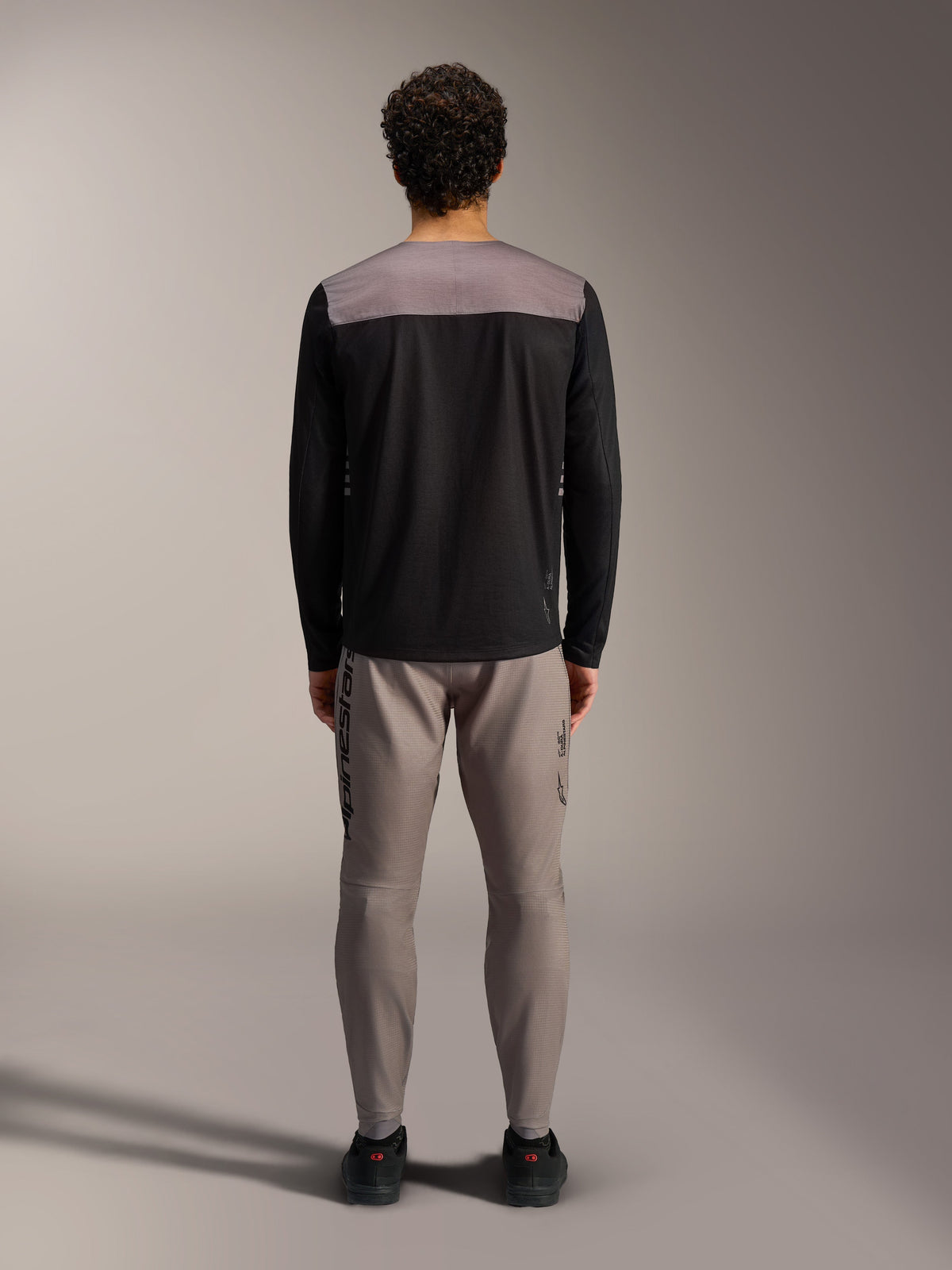Alpinestars A-Dura Elite 2.0 Long Sleeve Jersey in black and grey, versatile MTB trail riding gear, back view.