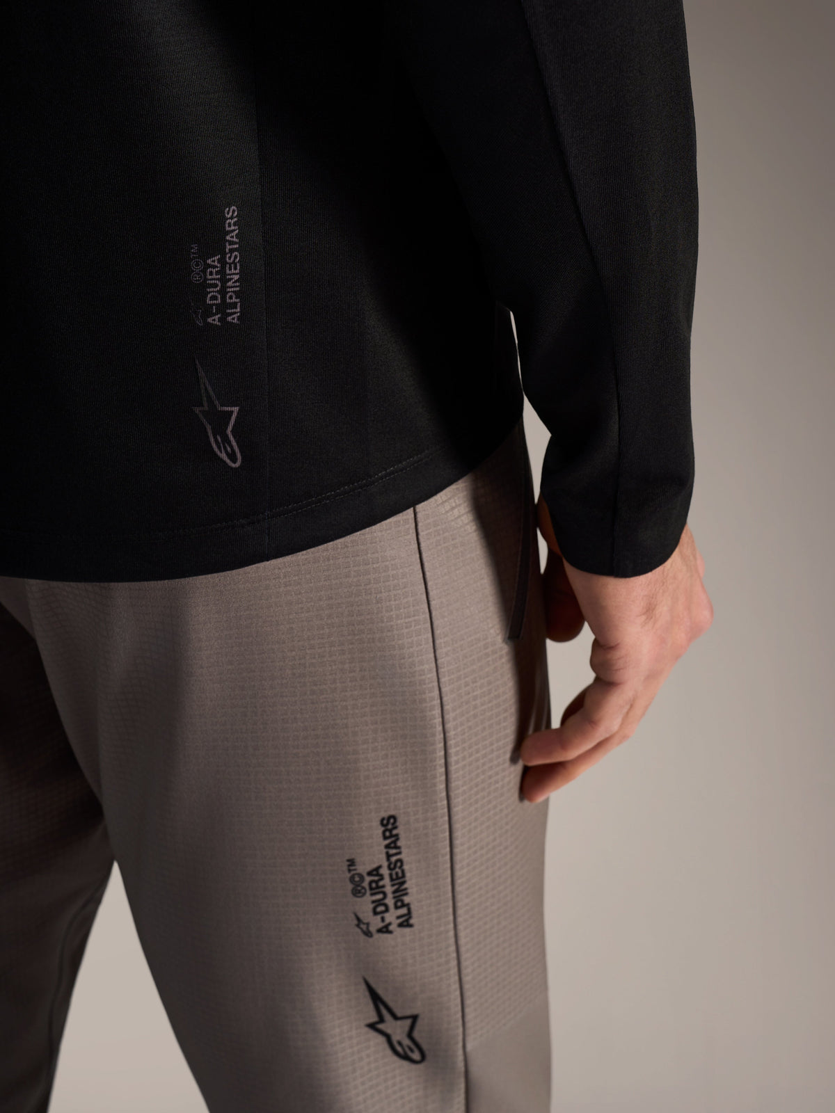 Black A-Dura Elite Long Sleeve Jersey 2.0 featuring Alpinestars branding and technical fabric for MTB trail performance.