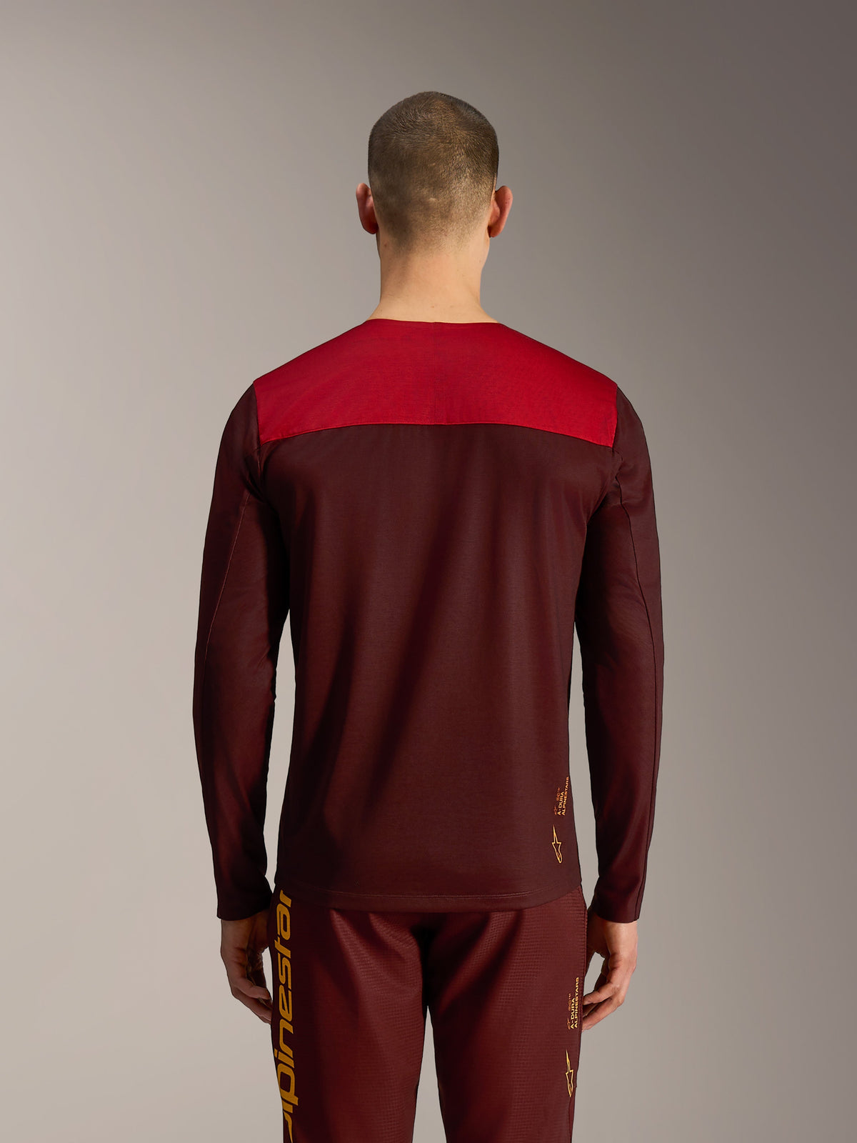Alpinestars A-Dura Elite Jersey 2.0 Long Sleeve, Bordeaux with red shoulder panel, back view of performance MTB gear.