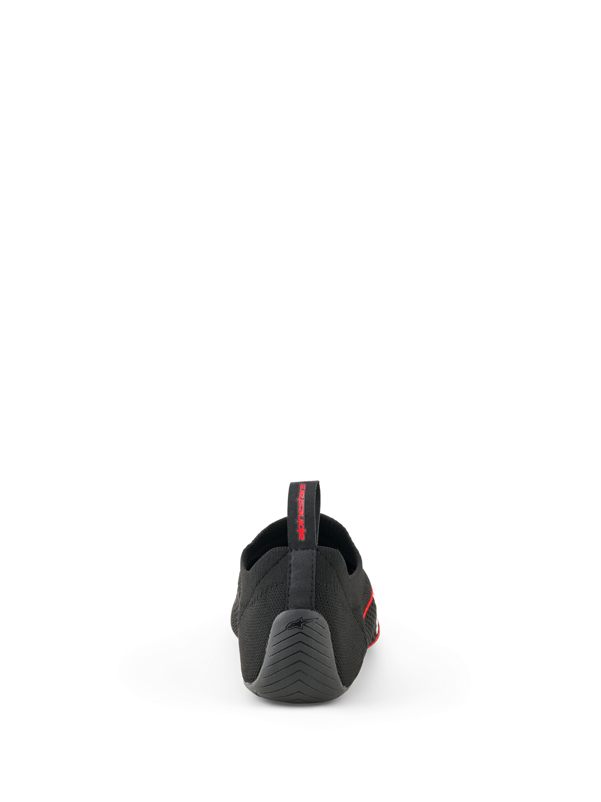 Alpinestars Tech Gaming Shoes, Black, back view showing the seamless knitted upper, textured rubber heel with star logo, and rear pull tab with red branding, SIM-racing footwear