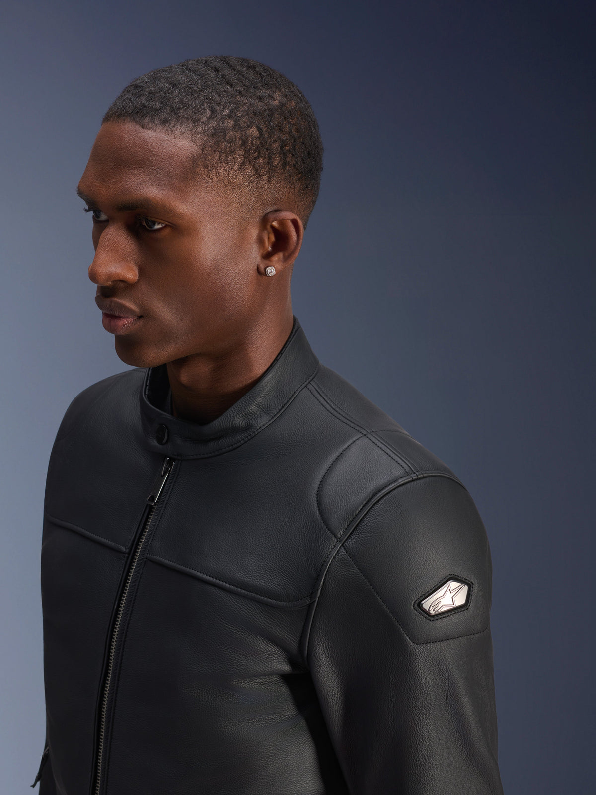 Alpinestars Blacktrack Leather Jacket, black bovine leather urban motorcycle jacket for men with metallic shoulder badge.