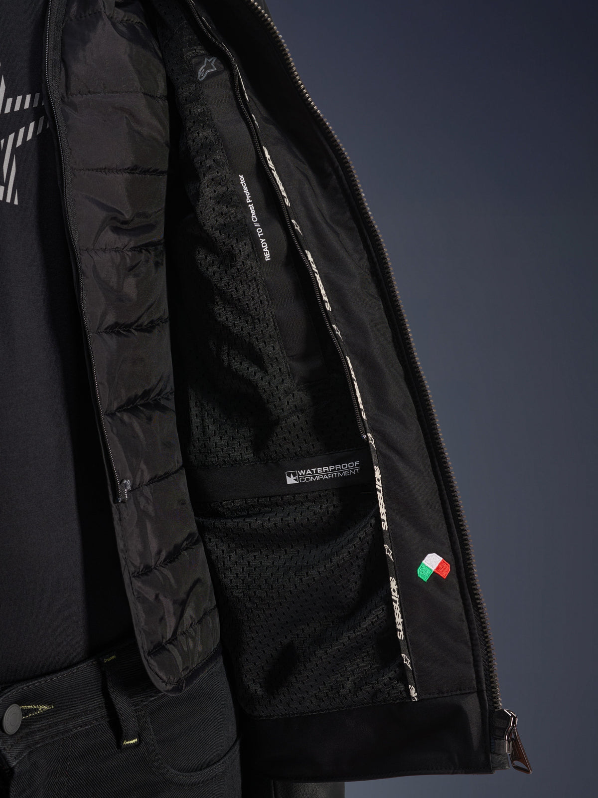 Alpinestars Blacktrack Leather Jacket, Black motorcycle jacket interior with quilted thermal vest and waterproof compartment.