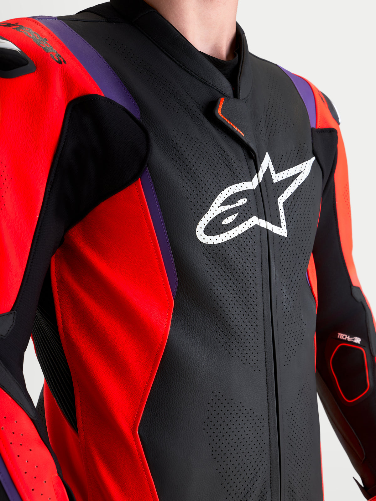 Alpinestars Missile V3 Leather Suit 1 Piece, Motorcycle Racing Suit, Black Red Fluo Purple, featuring perforated race-grade leather and white Astar logo chest branding, detailed view of track-ready protective gear