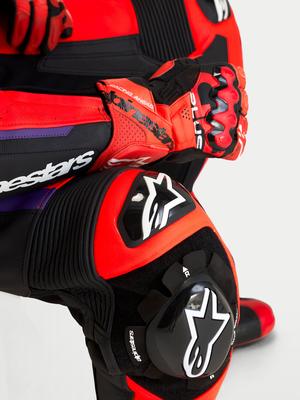 Alpinestars Missile V3 Leather Suit 1 Pc, 1-piece motorcycle racing suit, Black Red and Purple, featuring integrated DFS ST knee and elbow armor and race-grade leather construction