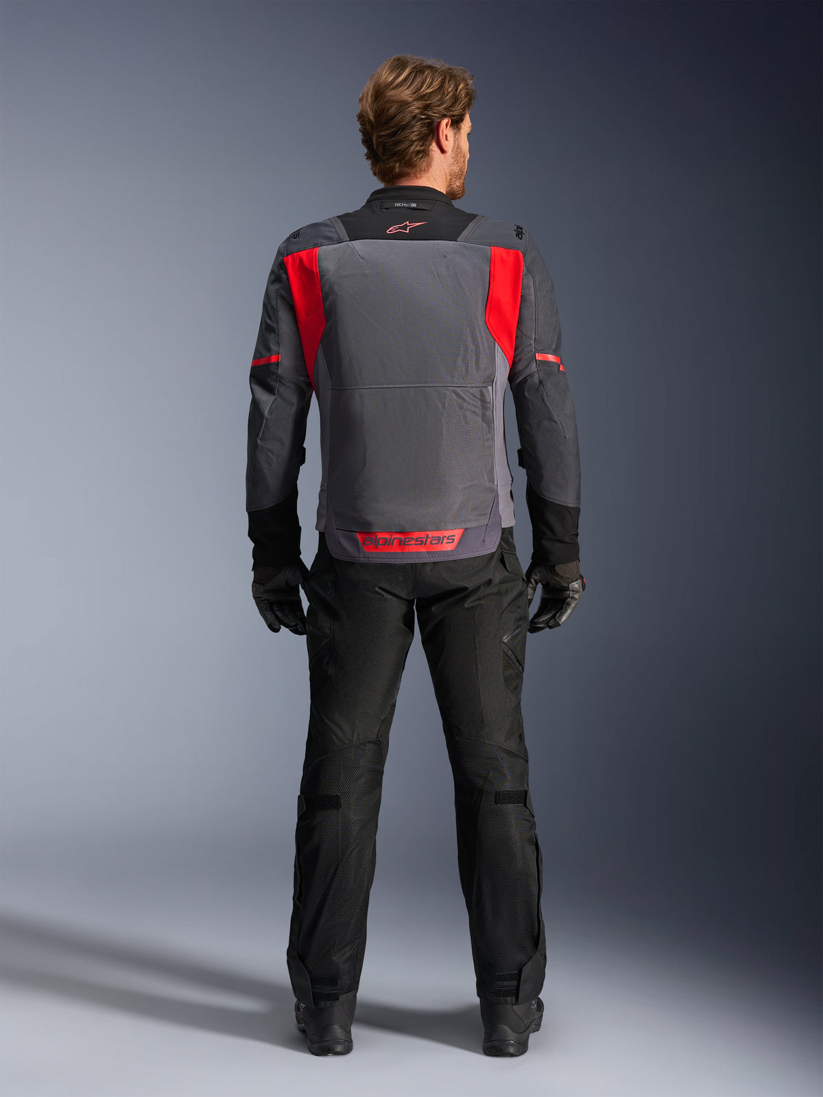 Alpinestars ST-2 Air Jacket, Men's Gray and Red motorcycle touring jacket, rear view with mesh ventilation panels.