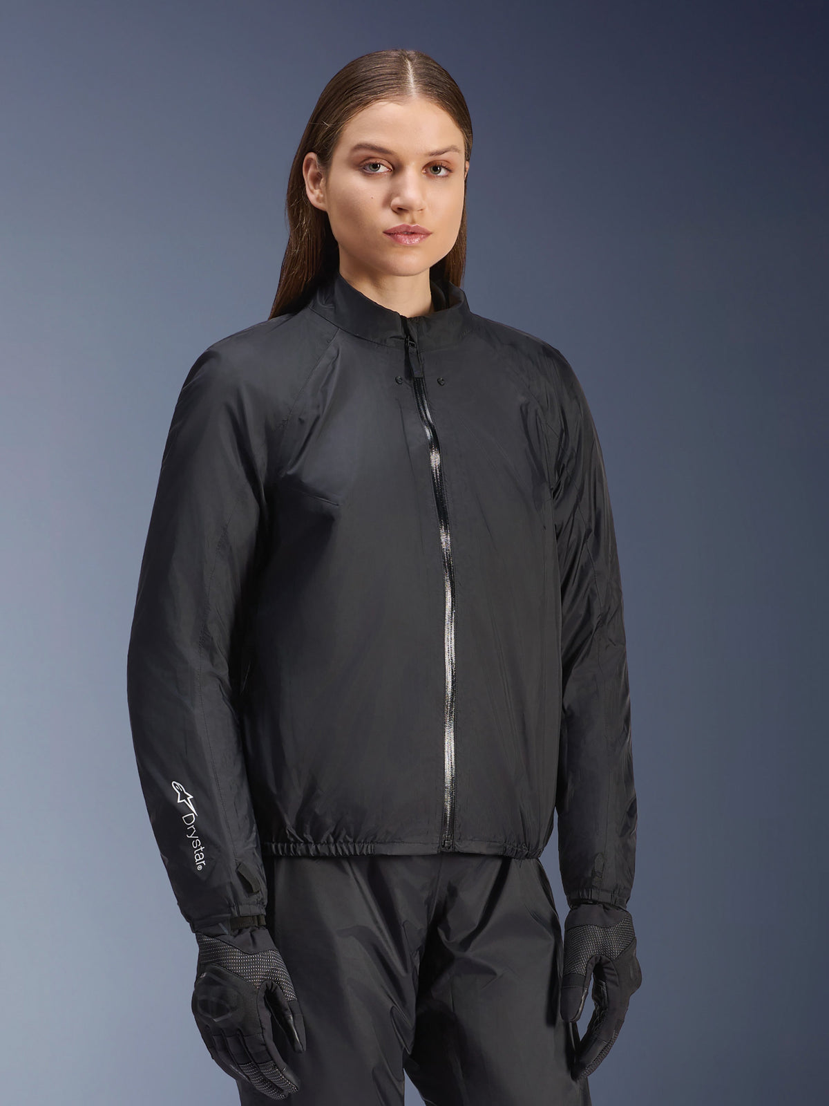 Alpinestars Stella Andes Air Drystar® Jacket, Women's Motorcycle Jacket, Black, featuring the detachable waterproof membrane layer with a full front zipper and Drystar logo on the sleeve, worn with matching black riding pants and gloves