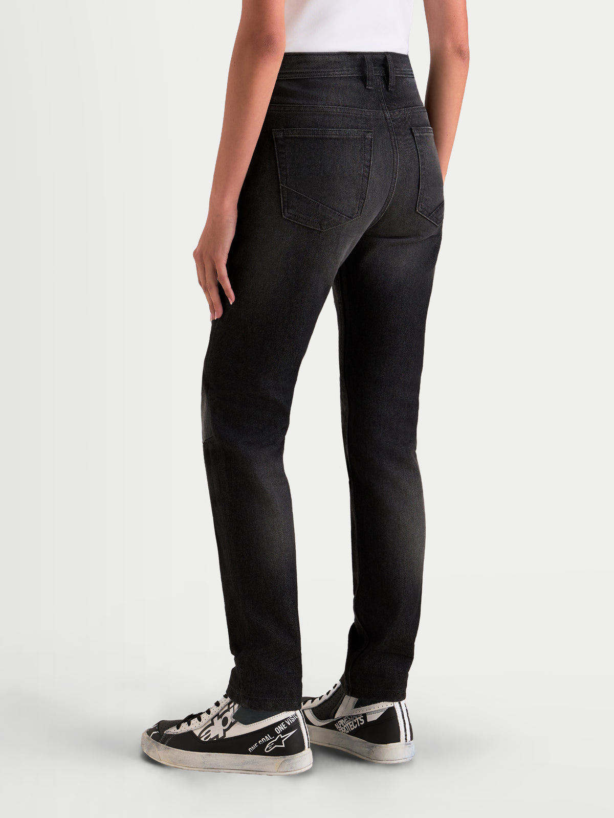 Alpinestars Stella Flex-AST 5 Denim Pants Short, women's urban riding motorcycle denim pants in black washed, rear view showing the raised back waistband and single-layer tech denim construction worn by a model.
