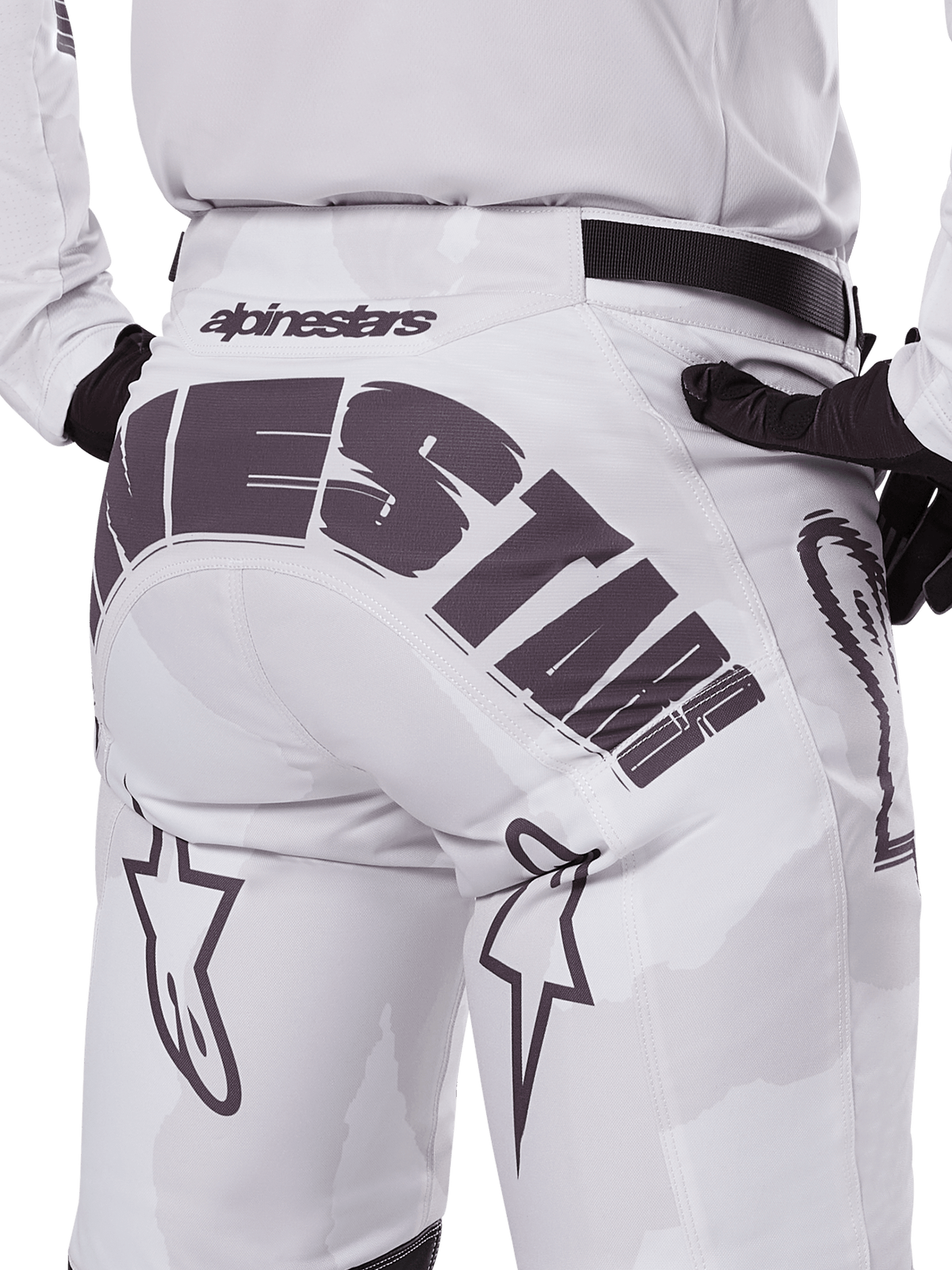 Alpinestars 2025 Racer Hollow Pants, Motocross Pants, Light Camo Brown, close-up back view featuring large Alpinestars branding across the seat, star logos on the legs, and a black adjustable waist strap, designed for off-road racing