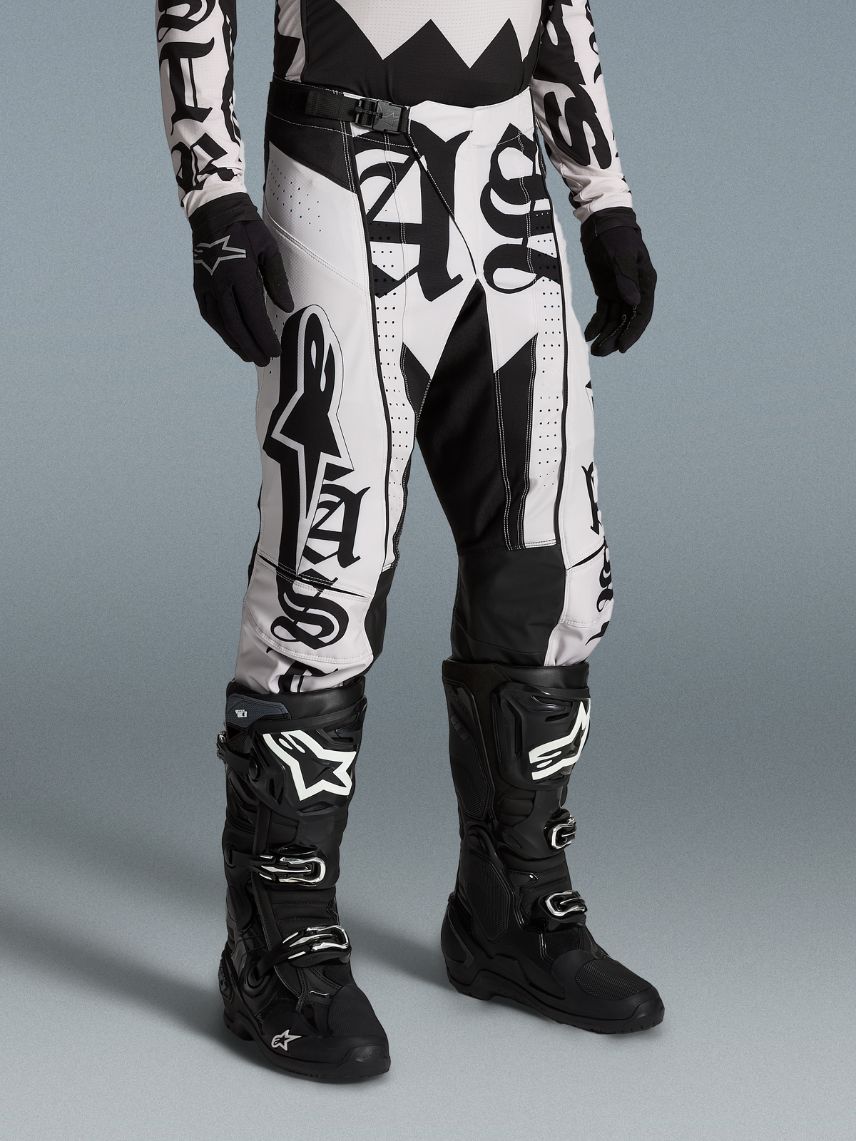 Alpinestars Limited Edition Techstar Wolf Dust Pants, black and white motocross gear with graphic print and athletic fit.