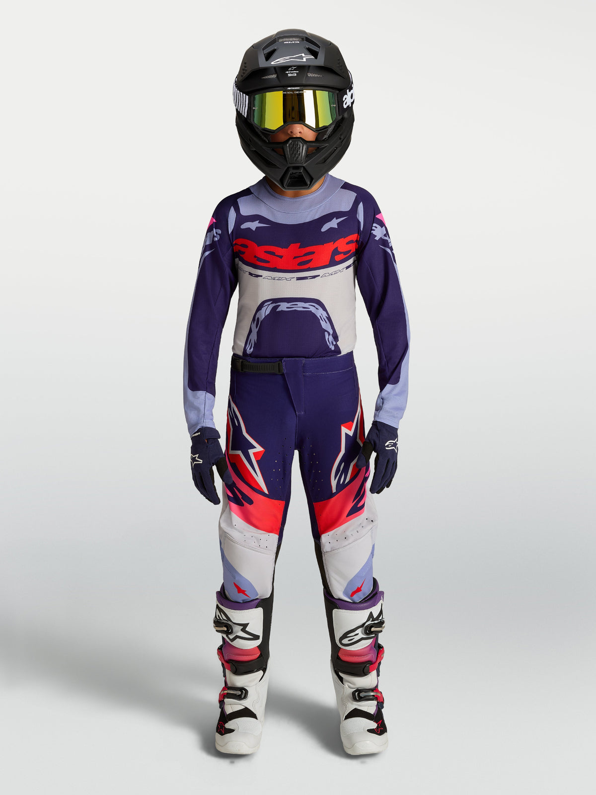 Alpinestars Youth Supertech Dyna Motocross Pants, purple and pink fluo gear set shown on-model for off-road racing.