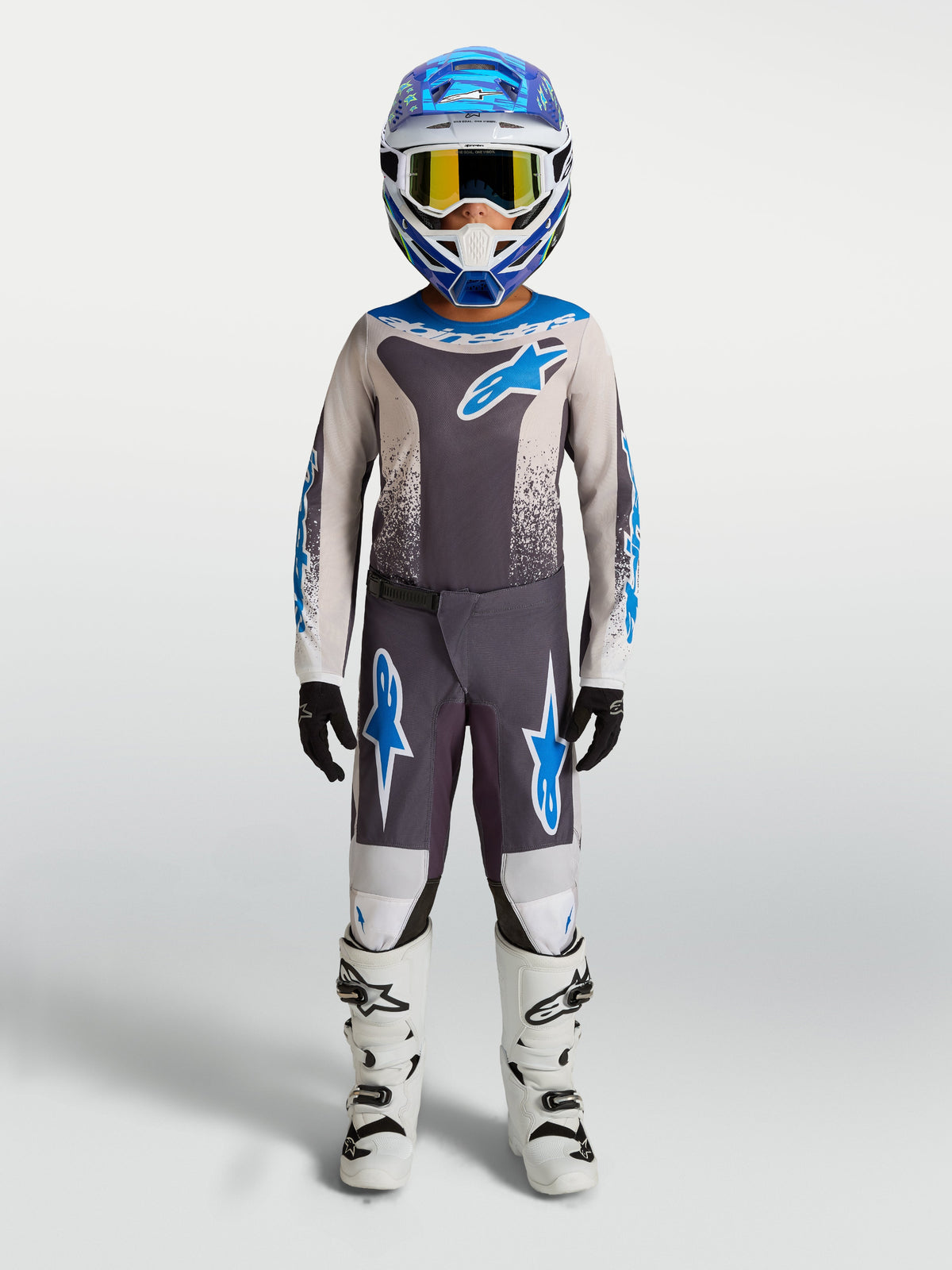 Alpinestars 2027 Youth Fluid Drag Gear Set, graystone and UCLA blue kids' motocross outfit for off-road racing performance.