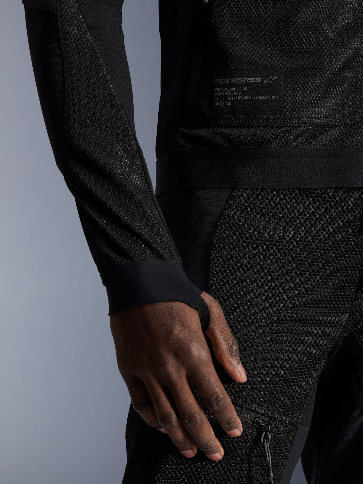Alpinestars Troop-Air Jacket, black urban summer motorcycle jacket with technical mesh and thumb-hole loops.
