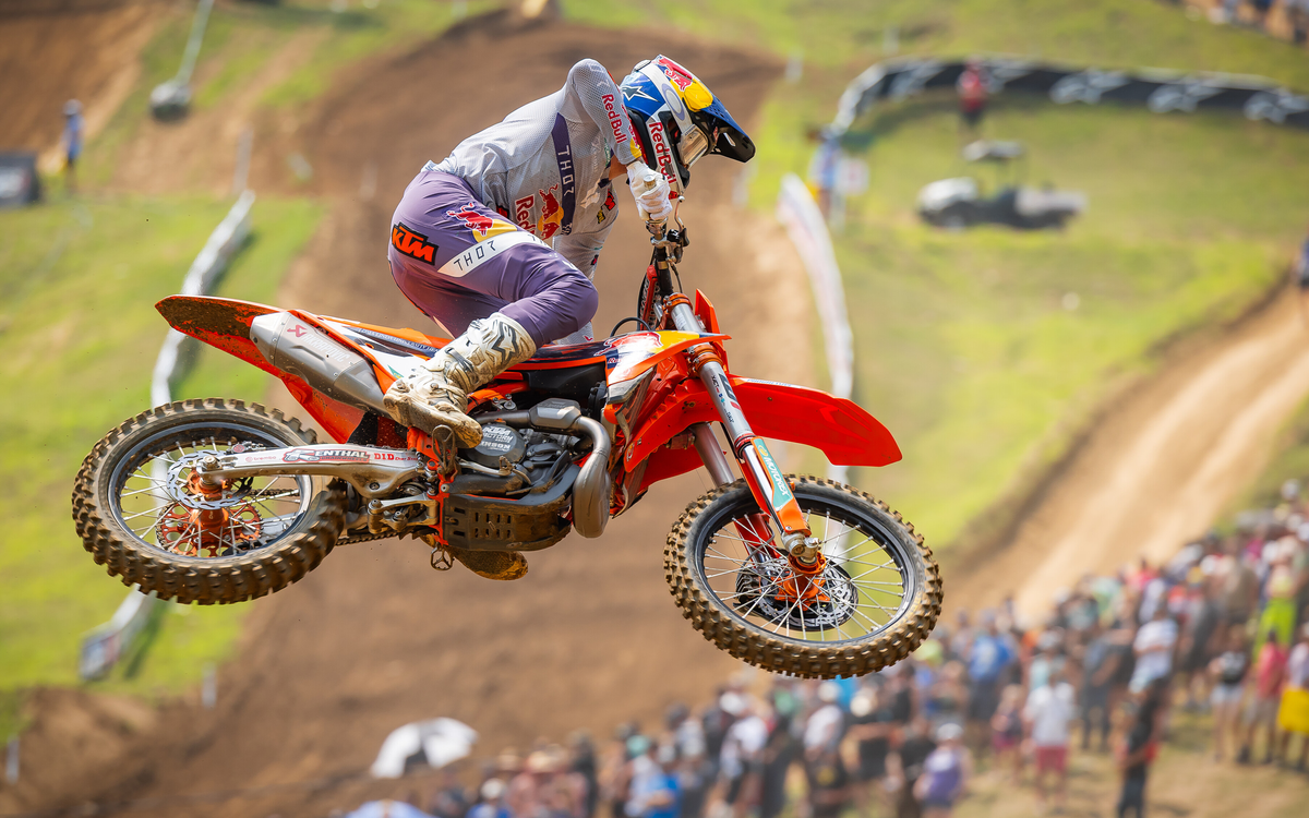 Aaron Plessinger performing a stunt on his mx bike while wearing Alpinestars clothing and protections