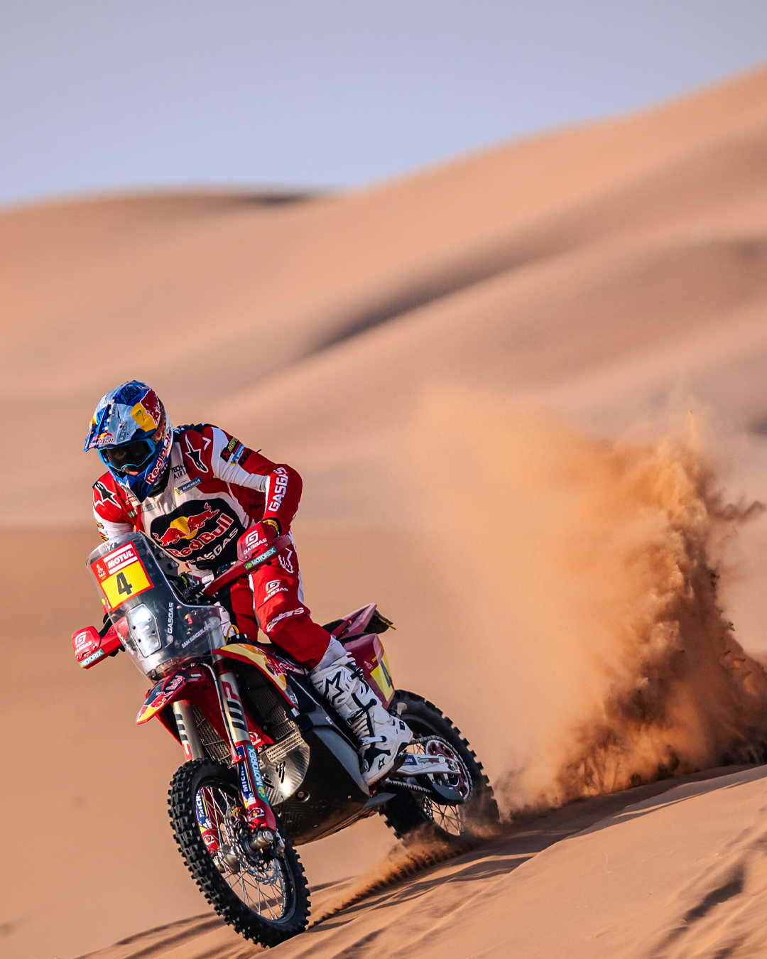 Sam Sunderland riding in the desert wearing Alpinestars enduro apparel and protections
