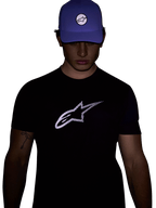 Alpinestars Exemption Performance Tee, Short Sleeve T-Shirt, Black, Featuring a large white reflective Alpinestars logo on the chest, worn with a blue cap, designed for visibility and performance sportswear