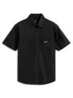 Alpinestars Strive Woven Shirt, Short Sleeve Button-Up Shirt, Black, featuring a white Astar logo on the chest pocket, classic collar and button-front placket, casual motorsport-inspired streetwear