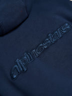 Alpinestars Emergent Oversized Hoodie, Navy Blue, close-up detail of tonal 3D embroidered Alpinestars word logo on back, premium fleece texture