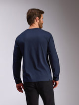 Alpinestars Mandatory CSF Tee, Long Sleeve, Navy blue, back view of a man wearing a casual crewneck long sleeve t-shirt, featuring a logo on the sleeve, motorsport-inspired sportswear