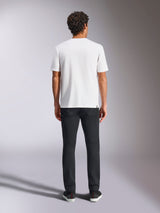 Alpinestars Plate CSF Tee, Short Sleeve T-Shirt, White, Rear view on model, paired with black pants, casual motorsport streetwear