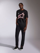 Alpinestars Authority CSF Tee, Short Sleeve T-Shirt, Black, Large Cropped Astars Logo with Red and White Outlines, worn by a model, Casual Motorsport Streetwear