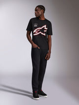Alpinestars Authority CSF Tee, Short Sleeve T-Shirt, Black, large red and white cropped Astars outline logo, worn by a model with black pants and sneakers, casual motorsport streetwear