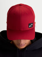 Alpinestars Pivot Hat, Casual Sportswear Baseball Cap, Dark Red, Unisex, featuring a curved bill, structured crown, and a small black Astars logo embroidered patch on durable twill fabric, on-model view.