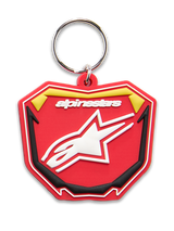 Alpinestars Plate Keyfob, 3D molded keychain, Red Yellow and Black, white Alpinestars logo and Astars star symbol, silver metal snap ring, motorsport-inspired MX plate design