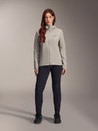 Alpinestars Woman Stella A-Dura Thermal Jacket, Mountain Bike Jacket, Titanium gray, worn with black technical pants and black footwear, featuring a fleece-lined hood and red chest logo, designed for cold-weather riding