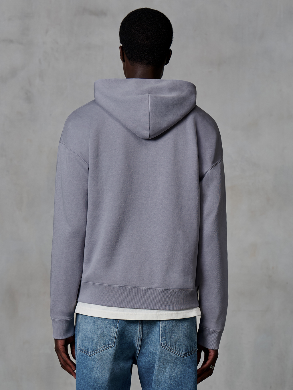 Alpinestars Essentials Ageless Zip Hoodie, Silver, back view, casual streetwear, relaxed fit with garment stone wash finish, paired with blue jeans and white undershirt