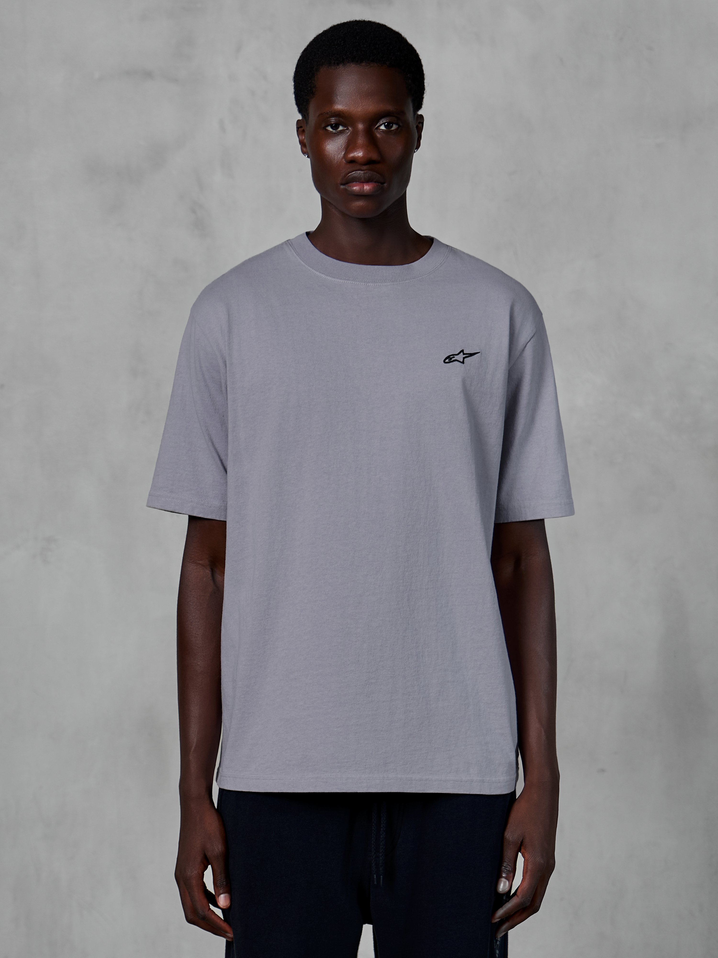 Alpinestars Essentials Ageless SS Tee, Short Sleeve T-Shirt, Silver, featuring a small black Astars logo on the chest, relaxed contemporary fit, casual motorsport-inspired streetwear