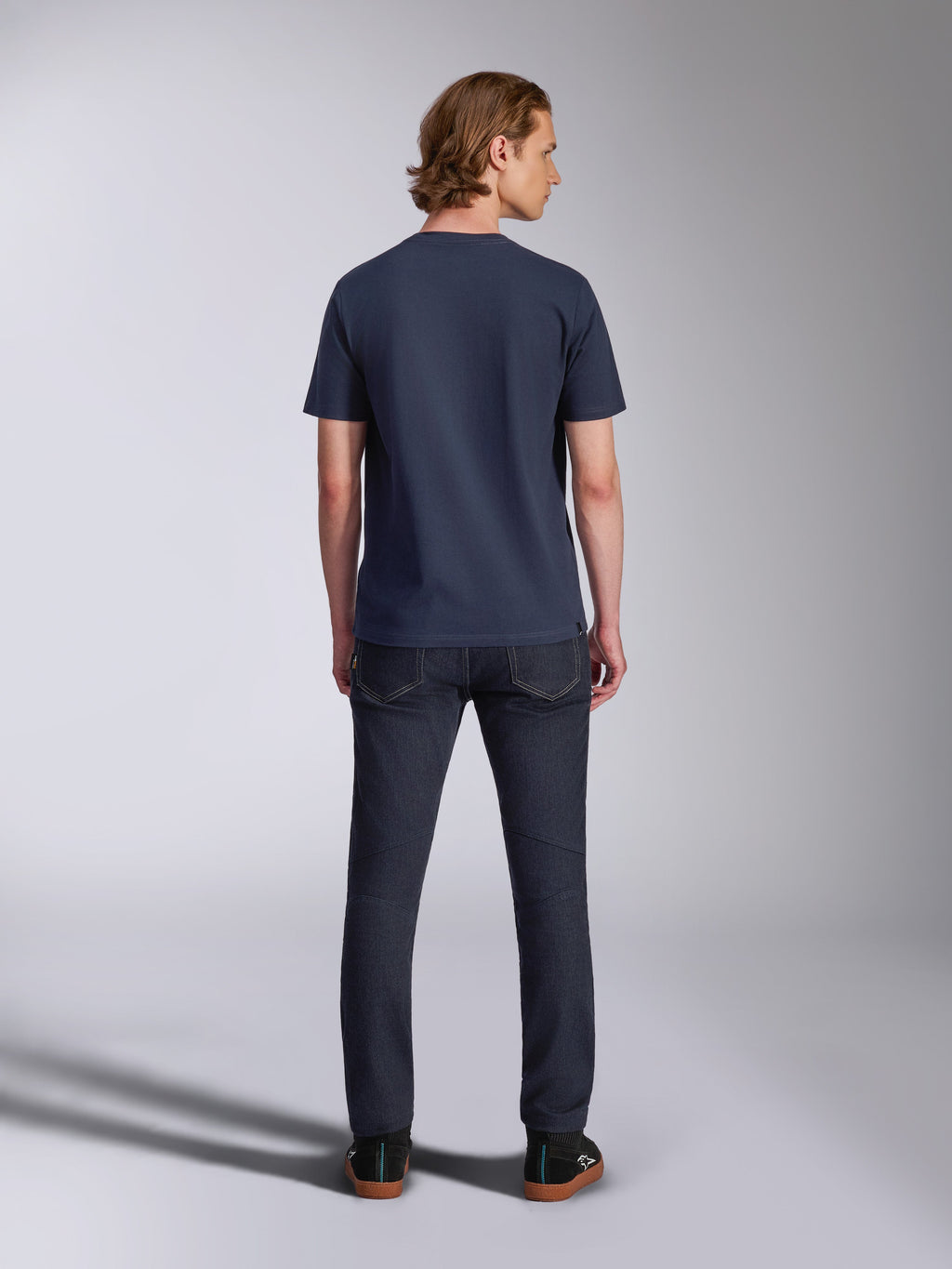 Alpinestars Collared CSF Tee, Short Sleeve T-Shirt, Navy Blue, back view on model wearing dark denim jeans and black sneakers, sustainable performance moisture-wicking fabric, casual sportswear