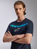 Alpinestars Collared CSF Tee, Short Sleeve T-Shirt, Navy Blue, Teal gradient Alpinestars wordmark and white star logo, worn by model with arms crossed, casual performance sportswear