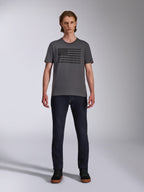 Alpinestars Waving CSF Tee, Short Sleeve T-Shirt, Charcoal Gray, Black Blaze 2.0 flag-style logo graphic, Casual Motorsport Streetwear, worn with dark denim jeans