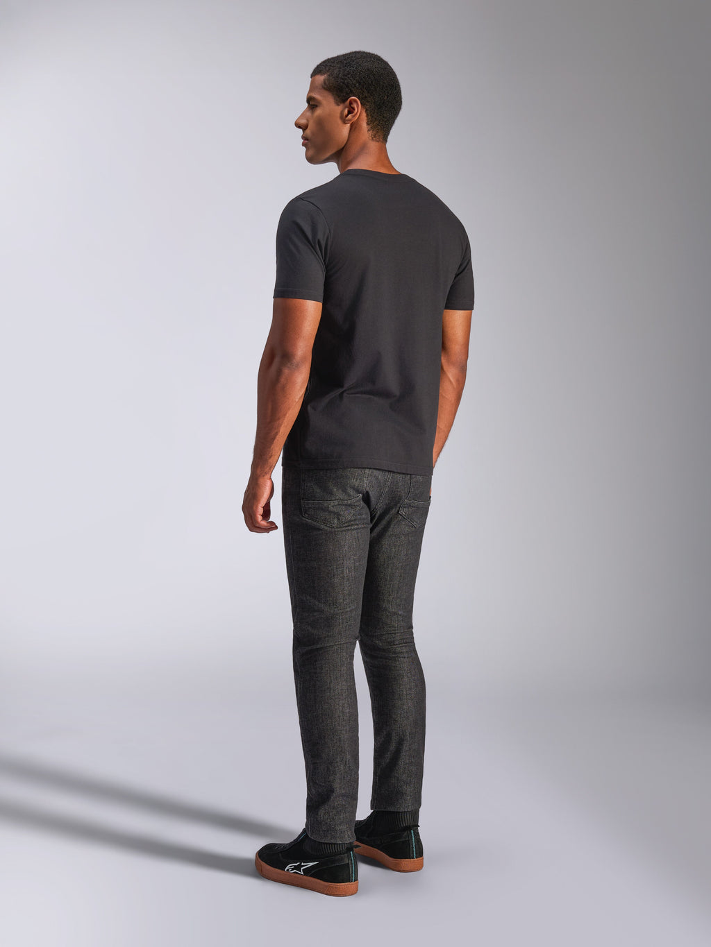 Alpinestars Tech Boot CSF T-Shirt, Black men's short sleeve sportswear tee, shown from a rear view on a model.