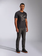 Alpinestars Tech Boot CSF T-Shirt, Black motorsport sportswear tee featuring a white boot graphic, worn by a model.