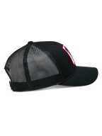 Alpinestars Booted Trucker Hat, black mesh-back snapback cap, side view highlighting the breathable poly mesh, braided rope trim, and curved bill, casual motorsport headwear